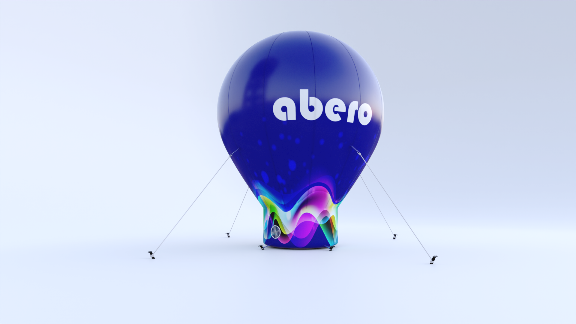 Pneumatyczny balon reklamowy w kształcie kropli z logo "abero" na granatowym tle z kolorowymi akcentami; balon jest stabilizowany za pomocą odciągów i posiada zintegrowany system nadmuchowy, przeznaczony do celów promocyjnych i eventowych.